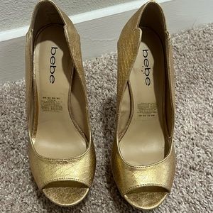 BEBE Gold Platform Heels